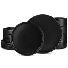 black plates stacked on top of each other