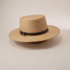 Description The Wide Brim Straw Sun Hat - Cozumel for Men & Women is inspired by hats worn by gondoliers in Venice. The Cozumel Sun Hat has a stiff flat crown and brim with a genuine leather hatband. The lightweight construction and tightly woven pattern make it an excellent accessory for a morning on the water. Wide Brim Straw Sun Hat - Cozumel for Men & Women works just as well afternoon at a social gathering, or an evening... drinking a cold one with your pals. Brim 3" Crown 4" Featherweight Country Style Flat Crown Hat For Kentucky Derby, Country Style Short Brim Hat In Toquilla Straw, Country Style Short Brim Toquilla Straw Hat, Classic Brimmed Natural Color Hats, Classic Brown Panama Hat With Flat Crown, Classic Natural Brimmed Hats, Brown Toquilla Straw Sun Hat With Flat Crown, Country Style Straw Hat With Flat Crown For Beach, Natural Toquilla Straw Hat With Flat Crown