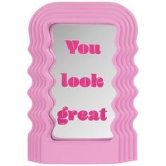 a pink frame with the words you look great on it