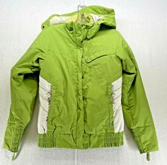 Columbia womens S green jacket storm dry waterproof. Hooded.  Mountain and trees pattern lining. Lots of pockets. 20" armpit to armpit. Elastic at the hem and wrists. 25.5" length. Zippered pockets. Snap off hood. Toggle adjustments. Zippered and snap closure. Candy Apple Green, Green Windbreaker, Pink And White Stripes, Tree Patterns, Ski Jacket, Windbreaker Jacket, Green Jacket, Zipper Pocket, Columbia