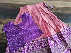 This Lehenga suits 6 yr - 7 yr. Kindly please contact us if needed measurements before purchase. Designer Cotton Silk Sets For Navratri, Cotton Silk Sets For Diwali With Traditional Drape, Cotton Silk Sets For Navratri, Cotton Silk Sets With Traditional Drape For Festivals, Diwali Cotton Silk Sets With Traditional Drape, Diwali Cotton Silk Sets In Traditional Drape, Pink Sets With Unstitched Blouse For Eid, Designer Cotton Silk Sets For Diwali, Cotton Silk Sets With Traditional Drape For Navratri