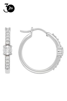 Moissanite Fire�� .78ctw diamond equivalent weight round, Platineve�� hoop earrings. Measures approximately 13/16" L x 1/8" W and have saddle backs. Actual moissanite weight is .60ctw. Oval Halo Design Cubic Zirconia Hoop Earrings, Classic Diamond White Huggie Earrings With Halo Design, Oval Cubic Zirconia Hoop Earrings With Halo Design, Cubic Zirconia Halo Hoop Earrings, Fine Jewelry Cubic Zirconia Hoop Earrings With Halo Design, Timeless Small Hoop Jewelry With Prong Setting, Diamond Halo Design Hoop Earrings, Diamond Hoop Earrings With Halo Design, Small Hoop White Gold Jewelry With Halo Design