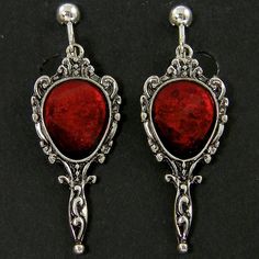 Dark blood red and antique silver clip on earrings feature an ornate mirror shape with red resin inlay. Style brings to mind vampire movies or old fairy tales. Earrings are 1 3/4 inches (45mm) long with screw backs and comfort cushions. See all photos for size reference. Matching necklace - https://www.etsy.com/listing/1069303835/dark-blood-red-antique-silver-necklace?ref=listing_published_alert Thank you for stopping by! Find more clip on styles here - https://www.etsy.com/shop/CharleneSevier?r Vampire Fairy, Vampire Jewelry, Resin Inlay, Antique Silver Necklace, Vampire Movies, Menu Sign, Ornate Mirror, Gothic Victorian, Dark Blood