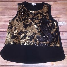 Black And Gold Sequin Top. Because Of The Design, It Looks Like It’s Cropped In The Front And Has A Longer Tail In The Back But The Shirt Is A Tank That Is Even. Nwot. Sequin Tops For Going Out In Spring, Sleeveless Tops For Fall Going Out, Black Sequined Tops For Spring, Gold Sequin Top, High Low Top, Gold Sequin, Long Tail, Sequin Top, Low Top