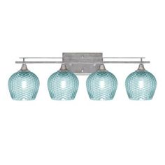 three light bathroom fixture with blue glass shades on the bottom and chrome fixtures above it