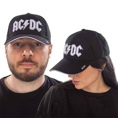 An official licensed unisex Cotton Baseball Cap featuring the AC/DC 'White Logo' design motif. This high quality headwear is available in a black colourway. High Embossed Application. Dimensions: Adjustable Rocker Tank Tops, Rocker Tank, Cap White, Embroidered Baseball, Embroidered Baseball Caps, Red Logo, Band Merch, Aerosmith, Tour Shirt