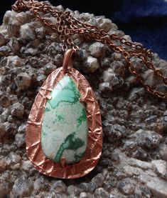 Created from  copper metal clay, this one of a kind pendant is a great spring to summer pendant due to the lovely shades of green that the variscite showcases.  The abstract line detail of the texture that was hand drawn adds to the uneven shape of both the stone and the metal backing itself.  The pendant was placed on an over-sized bail and hangs on a 24 inch antique copper rolo chain. Variscite is a stone of serenity that balances and promotes courage and universal love.  It has a soothing nat Metal Clay Pendant, Summer Pendant, Silver Metal Clay, Abstract Jewelry, Pendant Bails, Boho Pendant, Copper Pendant, Handcrafted Necklace, Statement Pendant