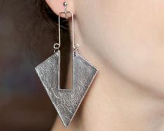 Pair of earrings Chunky jewelry Silver statement Large dangles | Etsy Triangle Silver Jewelry For Party, Modern Silver Triangle Earrings, Silver Triangle Earrings For Party, Silver Triangle Party Earrings, Silver Triangle Single Earring, Silver Triangle Metal Jewelry, Nickel Free Triangle Metal Earrings, Handmade Silver Geometric Earrings, Nickel-free Metal Triangle Earrings