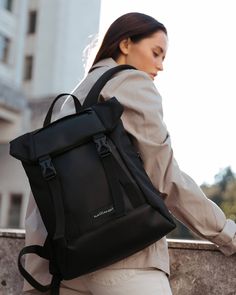 "HIGHLIGHTS: ✔️ Durable fabric ✔️ Padded straps and back for comfort ✔️ Compartment for a laptop up to 15\" ✔️ 1 front pocket ✔️ 1 side pocket Black roll top backpack for women: ✔️ Handmade ✔️ 100% vegan ✔️ Eco-leather, only organic materials ✔️ Unique design ✔️ Add personalization if you want More backpacks for urban city tour https://etsy.me/2JHH72X Need something that will let your hands stay free? Here https://etsy.me/2JGaXEW MEASUREMENTS: ✔️ Height: 37 cm / 14\"6 ✔️ Width: 30 cm / 11\"8 ✔️ Backpack Minimalist, Basic Necessities, Luggage Black, Roll Top Backpack, Black Rucksack, Canvas Rucksack, Street Style Bags, Work Backpack, Vegan Leather Backpack