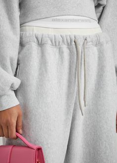 Find ALEXANDER WANG Logo Layered Cotton Sweatpants on Editorialist. Info & Care alexanderwang.t cotton sweatpants Logo-jacquard ribbed boxer-effect underlay at drawstring;waist, zip-fastening side pockets Pull-on Fabric 1: 100% cotton; fabric 2: 67% cotton, 29% polyamide, 4% elastane Machine wash; Size & Fit Inside leg length: 28.5 inches/ 72.5cm Midweight Relaxed fit, slim across the high waist Model is 5'7'/ 170cm and wears a size small; Spring Cotton Joggers With Ribbed Waistband, Spring Cotton Sweats In Athleisure Style, Cotton Sweats With Elastic Waistband For Spring, Spring Cotton Sweats With Ribbed Waistband, Sporty Cotton Sweatpants For Spring, Wide Leg Athleisure Joggers With Elastic Cuffs, Cotton Joggers With Drawstring, Baggy Cotton Joggers With Ribbed Cuffs, Cotton Wide Leg Joggers With Ribbed Waistband