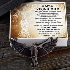 What is the best gift idea for your Mom for her Birthday, Christmas, Thanksgiving, Graduation, Mother's day etc? Why not surprise her with a unique yet charming Dark Raven Necklace? This necklace features a dark raven pendant which is an iconic and magical creature in the Viking world, specially designed for Viking lover. It will be with her side by side, wherever she goes so she can feel that you are always there for her. The necklace also comes with a lovely handmade gift box and a heartfelt m Mother's Day Necklace With Gift Box, Inspirational Jewelry Gift With Box, Inspirational Jewelry With Gift Box, Gift-wrapped Necklace For Birthday On Mother's Day, Mother's Day Birthday Gift Wrapped Necklace, Meaningful Necklace For Mother's Day With Gift Box, Father's Day Jewelry Gift With Box, Mother's Day Jewelry With Gift Packaging, Novelty Necklaces For Valentine's Day Gift