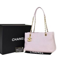 Absolutely Lovely And Stunning Authentic Chanel Gorgeous Light Blush Pink Cc Logo V Stitch Chain Shoulder Quilted Leather Tote Handbag This Fabulous Gorgeous Subtly Bright And Elegant Medium Sized Tote Bag Features *Pink Quilted Lambskin Soft Leather, *Huge Chanel Cc Logo Gold Tone Hanging Charm With Gold Chain And *Leather Chain Shoulder Strap With A 11" Drop * 2 Open Inner Pockets And 2 Zipper Compartments L 11.8" X H 7.5" X D 5" (Approx.) Excellent Pre-Owned Condition, Was Very Sparingly Used Designer Pink Shoulder Bag For Everyday Luxury, Designer Pink Shoulder Bag For Formal Occasions, Designer Pink Bag For Formal Occasions, Elegant Pink Shoulder Bag For Shopping, Pink Rectangular Shoulder Bag For Everyday Luxury, Chic Pink Everyday Luxury Bags, High-end Pink Formal Bags, Elegant Pink Shopping Bag, Luxury Pink Shoulder Bag For Shopping