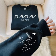 Personalized Nana Sweatshirt, Custom Nana Est With Kids, Grandma Gift TH Sweatshirt Suitable for many occasions such as Christmas, Father's Day, Mother's Day, birthday This classic crew-neck sweatshirt is an essential basic item for anyone’s wardrobe. The ribbed cuffs on the sleeves and waist are reinforced, and the high-quality cotton ensure that anyone will enjoy this cuddly and cool sweatshirt for many moons to come. Preshrunk fleece knit Double-needle stitching at shoulder, armhole, neck, wa Minimalist Mama, Idee Cricut, Cute Shirt Designs, Mama Sweatshirt, Mom Sweatshirt, Custom Sweatshirts, Mom Tees, Custom Hoodies, Cute Shirt