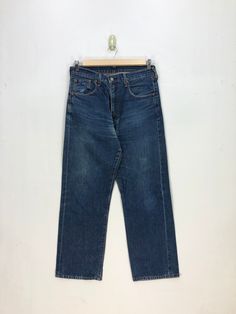 Levis Jeans Levis 502 Selvedge Denim Levis Redline Pants - BS47558.  Manual Measurement (laying in flat area):  1) Waist: 33 inch.  2) Rise: 12.5 inch.  3) Hips: 22.5 inch.  4) Tight: 12 inch.  5) Outseam: 40 inch.  6) Inseam: 29 inch.  7) Leg opening: 9 inch.  Made in: JAPAN.  Fabric Material: 100% Denim Cotton.  Condition: In good vintage condition overall.  Please check all the measurement to insyre a proper fit.  Remember to allow yourself some extra room for movement.  You can compare these information with your favourite pants too.  BS47558.  We do combining shipping.  Please Read Before Purchase. Drop your phone number. Tracking number can be tracked 3 - 5 days after shipment process. Please be patient waiting. This design and style by wearing it increases your confidence. All piece Dark Wash Wide Leg Bottoms With Zip Fly, Dark Wash Straight Leg Pants With Zip Fly, High Waist Dark Wash Pants With Zip Fly, Medium Wash Straight Pants For Streetwear, Straight Medium Wash Pants For Streetwear, Medium Wash Streetwear Pants With Standard Cut, Dark Wash Rigid Denim Bottoms With Zip Fly, Dark Wash Mid-rise Pants With Zip Fly, Streetwear Full-length Jeans With Zip Fly