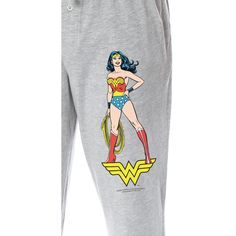 This classic Wonder Woman lounge pant is an DC Comics product! If you're a fan of DC Comics and Justice League superheroes, you're going to love this Wonder Woman merchandise! Wonder Woman is perhaps the most well-known female superhero of all time! She easily holds her own with other powerful members of the Justice League like Superman, Batman, Flash, and Green Lantern! She is truly an aspiring character for all females! These Wonder Woman pajama pants feature a top-notch print design of a vint Cotton Sleepwear With Character Print For Loungewear, Cotton Pants With Cartoon Print For Loungewear, Cotton Bottoms With Character Print For Pajama Party, Cotton Cartoon Print Pants For Loungewear, Cotton Lounge Pants With Cartoon Print, Cotton Lounge Pants With Character Print, Cotton Loungewear Bottoms With Character Print, Cotton Graphic Print Bottoms For Pajama Party, Flash And Green Lantern