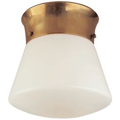 a light fixture with a white glass shade