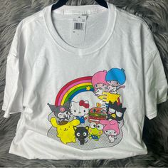 Brand New With Tags Smoke And Pet Free Home Sanrio Shirt With All The Characters: Kuromi, My Melody, My Little Twin Stars, Hello Kitty, Badzmaru, Pompompurin, Keroppi, Hamburger I Have Multiple Sizes Available! Please Check Out My Other Listings To Save On Shipping! Feel Free To Ask Questions And Make Reasonable Offers Through The “Make An Offer Button” Sanrio Shirt, Friends Graphic, Kuromi My Melody, Hello Kitty Friends, Twin Stars, Little Twin Stars, My Melody, Graphic T Shirt, Hello Kitty