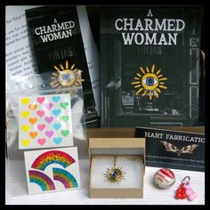 the contents of a charmed woman box are displayed