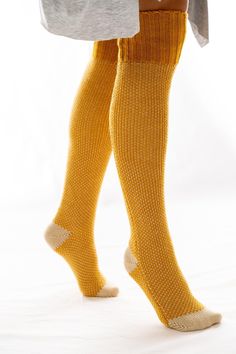 Lounging never looked so cute! These knitted lounge socks feature contrasting color detailing at the toes and heel with a large ribbed band at the top. Pull them up or shrug them down for a look that's cozy, comfortable and cabin approved. Model is 5'10" wearing a One Size. 100% Acrylic Import Comfy Cozy Fit Socks For Fall, Cozy Comfortable Knee-high Socks For Fall, Comfortable Socks For Fall, Comfortable Soft Knit Socks For Fall, Snug Comfortable Fall Socks, Comfortable Cozy Fall Socks, Cozy Comfortable Knee-high Socks For Stocking Stuffers, Comfortable Snug Socks For Fall, Cozy Super Soft Socks For Fall