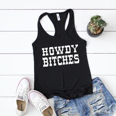 "Howdy Bitches tank top - Howdy Tank Top - Howdy Shirt - Country Shirt - Country Concert Shirt - Cute Country Tank top- cowboy tank- Festival Howdy Bitches tank top These Tank tops are PRETTY TRUE TO SIZE - If you prefer them \"form fitting\" then I would go a size down, if you want it real loose, go a size up Wash & Care Instructions: Wash inside out, do not iron (unless you iron from inside out) and Don't Bleach." Black Top For Spring Rodeo, Black Western Style Summer Tops, Black Western Style Tops For Summer, Black Western Tops For Summer, Cotton Tops For Rodeo In Summer, Fitted Tops For Rodeo In Summer, Trendy Black Tops For Rodeo, Western Style Summer Tops With Letter Print, Trendy Summer Tops For Country Concerts