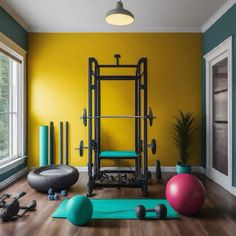 a gym room with exercise equipment and yoga mats in front of large windows, yellow walls