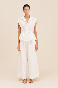 Cut from 100% cotton, the Wesley Trousers are an elevated wardrobe staple with multiple styling options. Designed to sit high on the waist, they're sharply pleated at the waistband and have straight, wide legs. Style yours with a tucked-in tank or oversized tee. High waisted Double hook and bar opening Fly front opening Trouser pockets Back pocket welt Wide leg Belt loops Wide turn back cuff Material: 100% Cotton Made in China Elevated Wardrobe, Heel Accessories, Trouser Pocket, Leg Belt, Hem Style, Fabric Belt, Denim Flares, Wide Legs, Oversized Tee