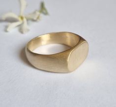 Classic pinky signet ring in an oval design, dainty minimalist ring jewelry for women, available in 14k gold plating, sterling silver and in 9k solid yellow gold.  This delicate handmade gold ring is elegant and minimalist. It was made by carving wax and casting it into metal.  It is available in high-quality 14k gold plating over brass, 14k gold plating over sterling silver, sterling silver and in 9k solid yellow gold.  This ring is very comfortable to wear and great for everyday use, and will Modern Oval Signet Ring As Promise Ring, Minimalist 14k Gold Oval Signet Ring, Modern Oval 14k Stamped Signet Ring, Yellow Gold Oval Jewelry With Simple Design, Modern 14k Stamped Oval Signet Ring, Minimalist Yellow Gold Oval Link Ring, Oval Yellow Gold Jewelry With Simple Design, Simple Oval Yellow Gold Jewelry, Simple Yellow Gold Signet Ring Gift