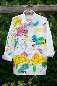 Hand Painted Shirt, blouses, with hand embroidered  can be an excellent, personalized gift for you or your loved ones. This handmade work is unique (not print), it will highlight your originality and will not leave others unnoticed! The drawing is applied with special professional paints that do not wash off.  Size and pattern may vary. To order, I can draw another drawing for you based on your idea. If you have questions or suggestions, please write to me in messages. We will discuss all the de Hand Painted Shirt Women, Painted Shirt, Fabric Painting On Clothes, Fabric Paint Designs, Paint Shirts, Denim Diy, Custom Clothing, Painted Clothes, Women Shirt