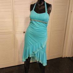 Comfortable Cocktail Dress With Stretchy Fabric. Beautiful Teal Blue Color. Never Worn. Ruffles On Bottom. Junior Size Large. 31 Inches From Waist To Bottom On Longest Part Of Dress. 15 In Around Front Waist And 20 In Around Front Chest. I'm A Fast Shipping Seller - I Accept Reasonable Offers. Send One My Way - You Rock! Thanks For Stopping By Fitted Blue Halter Dress For Evening, Blue Stretch Halter Sleeveless Dress, Blue Stretch Halter Dress For Spring, 2000s Dresses, Long Teal Dress, 2000s Dress, Midwest Princess, Dress 15, 2000s Clothes