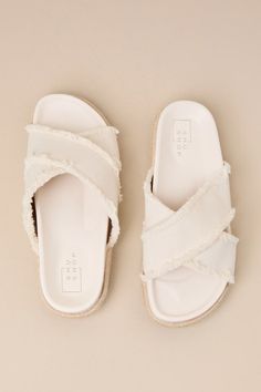 Compliments are guaranteed when you pair any of your favorite summer looks with the Shu Shop Courtney Bone Flatform Slide Sandals! These too-cute sandals feature an almond-shaped footbed and wide, frayed fabric straps that crisscross atop a peep-toe upper. The espadrille-wrapped flatform sole lends an extra-summery finish to the look, while the simple slide-on contoured design makes for easy styling! 0. 75" espadrille-wrapped sole. Smooth insole. Felted rubber sole has nonskid markings. Man Made Summer Open Toe Footbed Sandals With Textured Sole, Summer Synthetic Flip Flops With Cork-bed Midsoles, Beach Footbed Sandals With Textured Sole, Flat Footbed Sandals With Textured Sole For Beach, Spring Sandals With Textured Sole For Summer Outings, Beach Flat Footbed Sandals With Textured Sole, Spring Open Toe Flip Flops With Textured Sole, Spring Season Open Toe Flip Flops With Textured Sole, Synthetic Footbed Sandals For Spring