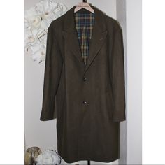 Saturdays New York City Kawano Wool Blend Overcoat Color: Military Olive Inside: Plaid Multicolor Shell 50% Wool 50% Polyester Body Lining 50% Cotton 50% Tencel Sleeve Lining 100% Polyester Classic Green Winter Outerwear, Tailored Green Winter Outerwear, Tailored Green Outerwear For Winter, Green Business Outerwear For Winter, Classic Green Workwear Outerwear, Classic Green Outerwear For Work, Classic Green Long Coat Outerwear, Classic Green Long Coat, Green Business Long Coat Outerwear