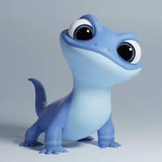 a blue toy with big eyes sitting on the ground