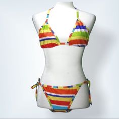 Chuns Rainbow Striped Triangle String Bikini Set. Traditional Style Bathing Suit With Adjustable Ties For The Bikini And The Bottom. Unlined With No Padding Or Wire Ties At The Back Of The Neck, Center Of The Back And Hips. Essential Swimsuit In Such A Cute Pattern. New Without Tags. Size Tag States One Size, However It Would Fit A Small Or Medium Best. Made In China 100% Polyester (Nwot) Multicolor String Swimwear For Beach, Cheeky Swimsuit Bottoms, Multicolor Tie-side Swimwear, Beachy Multicolor V-neck Swimwear, Adjustable Multicolor Tie-side Swimwear Bottom, Black Tankini Top, Hipster Women, Multicolor Tie-side Bottom Swimwear With Drawstring, Cheeky Bikinis