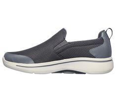 A classic walking style gets even more supportive comfort in the Skechers GO WALK Arch Fit - Togpath shoe. This pull-on sneaker features an athletic engineered mesh upper with removable Arch Fit insole and a lightweight ULTRA GO cushioned midsole. | Skechers Men's GOwalk Arch Fit - Togpath Slip-On Shoes Functional Low-top Slip-on Sneakers For Walking, Comfortable Sports Walking Shoes With Removable Insole, Comfortable Walking Shoes With Removable Insole For Sports, Comfortable Functional Sneakers For Walking, Athleisure Sneakers For Walking With Arch Support, Athleisure Walking Shoes With Ortholite Insole, Sporty Slip-on Sneakers With Arch Support For Walking, Slip-resistant Athleisure Walking Shoes, Gray Sneakers With Arch Support For Walking