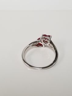 "Thanks for shopping our vintage estate store. We tend to sell well below wholesale and truly hope you enjoy all of our items. Many of the items are one of a kind, so please enjoy scrolling through the pictures and hopefully something will catch your eye. Black spots are from camera. Nice estate sterling silver 925 .50ct garnet heart with cz diamonds ring. This is a custom made ring from our shop, meaning we set the gems into the setting. Ring Size: please select a size Setting: 3/8\" 10mm Weigh Classic Heart-shaped Ruby Ring For Formal Occasions, Classic Heart-shaped Ruby Ring, Classic Ruby Ring For Anniversary On Valentine's Day, Classic Ruby Ring For Anniversary And Valentine's Day, Classic Rings With Prong Setting For Valentine's Day, Classic Round Ruby Ring For Valentine's Day, Classic Birthstone Ring For Valentine's Day With Prong Setting, Valentine's Day Classic Rings With Prong Setting, Valentine's Day Classic Anniversary Birthstone Ring