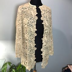 Gorgeous Ralph Lauren Black Label 100% Cotton Crochet Open Front Cardigan, Leather Trim, Floral Pattern, Long Sleeve Mesh Cardigan Open Front. Approx Measurement Ptp 19’’-21’’ Length 29’’ Material Content Body 100% Cotton Framing 100% Polyester Trim 100% Lamb Leather Elegant Cream Open Front Outerwear, Elegant Cream Long Sleeve Cardigan, Elegant Cream Open-front Outerwear, Beige Fitted Open Front Cardigan, Elegant Cream Cardigan For Layering, Fitted Beige Open Front Cardigan, Cream Long Sleeve Outerwear For Evening, Elegant Cream Cardigan For Formal Occasions, Beige Long Sleeve Outerwear For Evening