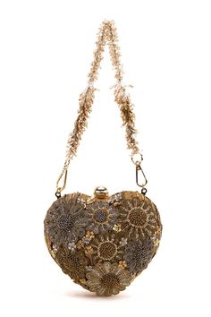 Gold heart bag embellished with beads, crystal, blossom applique and golden hardware detail. Comes with a beaded handle and a sling chain. - Aza Fashions Gold Heart-shaped Formal Bag, Luxury Heart-shaped Party Shoulder Bag, Chic Gold Heart-shaped Bags, Glamorous Gold Hand-embellished Evening Bag, Glamorous Gold Hand Embellished Evening Bag, Glamorous Embellished Bags, Glamorous Gold Beaded Shoulder Bag, Elegant Heart-shaped Bags, Luxury Hand-embellished Gold Bags