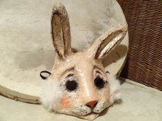 Paper mache rabbit mask bunny mask You are welcome to visit my other mask shop also https://www.etsy.com/shop/GreenMindedWolf Hare Mask, Paper Mache Rabbit, Mascara Papel Mache, Mask Rabbit, Raven Mask, Crow Mask, Rabbit Mask, Alice In Wonderland Diy, Paper Mache Mask