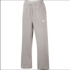 Meet Your New Go-To Sweats, The Nike Sportswear Women's Fleece Club Pants. Made With Soft Fleece Marked With The Nike Logo, They Feature A Roomy Fit And Stretchy Waistband For A Relaxed Feel. The Brushed-Back Fleece Feels Soft And Comfortable. An Elastic Waistband With Drawcord Has A Stretchy But Adjustable Fit. The Loose Fit Gives You Room To Move, While Front Pockets Store Your Stuff. Tracksuit Bottoms Nike, Nike Solid Color Loungewear Pants, Nike Full Length Sweatpants For Loungewear, Nike Fleece Pants For Loungewear, Nike Sweatpants For Loungewear, Nike Fleece Pants, Nike Fleece Bottoms For Loungewear, Dream Birthday, Nike Sportswear Women