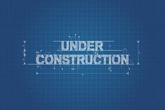 the words under construction on a blueprint background