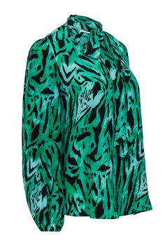 This vibrant green blouse by Rixo London is a star on its own. The silk fabric, distinctive animal print, and billowing sleeves give it a disco feel. Leave the necktie open for a more relaxed look or tie it to form a keyhole neckline. The blouse also plays nice beneath your favorite black blazer. Size S 100% Silk Loose fit V-neck w/ attached ties Long sleeves w/ elasticized cuffs Rounded hem Bust 38" Waist 38" Shoulder to hem 29" Sleeve length 23.5" Green Graphic Print Blouse For Spring, Chic Green Tops With Abstract Print, Chic Green Blouse With Abstract Print, Spring Green Tops With Abstract Print, Green Abstract Print Tops For Spring, Spring Green Top With Abstract Print, Green Abstract Print Top For Spring, Trendy Abstract Print Tops For Party, Trendy Abstract Print Party Tops