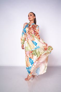 Product Details: I TOO Exclusive Regular fit Long sleeve with elastic cuffs Mandarin neckline Front button closure Waist self-tie Pullover styling Floral print Imported Model is wearing size S ﻿Model Info: Height: 5'8 Weight: 115 lbs Bust: 34 in Waist: 24 in Hips: 37 in Multicolor Print Long Sleeve Maxi Dress For Vacation, Mandarin Neckline, 115 Lbs, Floral Print Maxi Dress, Floral Print Maxi, Floral Maxi, Printed Maxi Dress, S Models, Pullover Styling