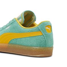 The Suede Hit The Scene In 1968 And Has Been Changing The Game Ever Since. It's Been Worn By Icons Of Every Generation, And It's Stayed Classic Through It All. Instantly Recognisable And Constantly Reinvented, Suede's Legacy Continues To Grow And Be Legitimised By The Authentic And Expressive Individuals That Embrace The Iconic Shoe. This Supertifo Version Features A Hairy Suede Upper, Speckled Laces, And A Bold Tongue Design. Features & Benefits Puma's Leather Products Support Responsible Manufacturing Via The Leather Working Group: Www. leatherworkinggroup. com Details Regular Fithairy Suede Upperhairy Suede Overlaystextile Liningspeckled Laces, With Hairy Suede Lace Looprubber Midsole And Outsolesynthetic Puma Formstrip And Fottextile Tongue With Striped Design And Puma Cat Embroiderypu Retro Green Skate Shoes With Round Toe, Retro Green High-top Skate Shoes, Vintage Green Sneakers With Round Toe, Retro Green Sneakers With Cushioned Footbed, Vintage Green Sneakers With Vulcanized Sole, Retro Green Skate Shoes For Streetwear, Green Retro Skate Shoes With Rubber Waffle Outsoles, Retro Green Skate Shoes With Rubber Waffle Outsoles, Retro Green Skate Shoes With Vulcanized Sole