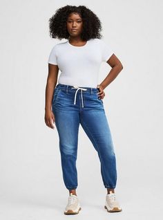 FIT Mid rise. . Relaxed jogger fit. Wear true-to-size or size up for a slouchier look. Perfect for every body shape. Inseams: Short: 25”; Regular: 27”; Tall: 29”. MATERIALS + CARE Knit Denim: That incomparably soft, stretchy feel of a knit legging in denim form. Stretch level: High. 86% cotton, 13% polyester, 1% spandex. Machine wash cold, inside out. Tumble dry low. Imported. DETAILS Fly-free drawstring waistband. 4-pocket design. Elastic cuffs at ankle. WHY WE LOVE IT They're the perfect combi New Street Style, Fly Free, Knit Denim, Swimming Outfit, Tall Jeans, Knit Leggings, Bra And Panty Sets, Mid Rise Jeans, High Rise Jeans