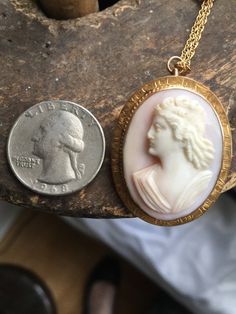 "Antique 10K Gold Victorian Pink Angel Skin Coral 3D Cameo Engraved Necklace 18\" Offered here is an antique 10k gold Victorian oval pink angel skin coral 3D cameo filigree necklace measuring; 18\" long. The engraved work & setting are just breath taking! The cameo measure 1.5\" high x 1 1/8\" wide. This piece is stamped 10K. Necklace closes securely with a jump ring. The chain is gold filled. Marked 1/20 12K. In nice, sturdy, excellent condition showing few signs of wear. Weighs; 3.6dwt or Antique Hallmarked Pink Jewelry, Antique Pink Hallmarked Jewelry, Pink Antique Hallmarked Jewelry, Pink Oval Victorian Jewelry, Formal Pink Cabochon Necklace, Antique Pink Round Jewelry, Pink Round Antique Jewelry, Pink Heirloom Jewelry Collectible, Pink Cameo Jewelry For Wedding