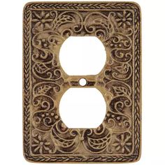 a decorative light switch cover with an ornate design