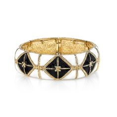 A bold bangle with a versatile color palette. Featuring white enamel panels decorated with gold-toned accents and a black enamel diamond pattern, this bracelet is the perfect go-to accessory for a quickie fashion fix. Set in gold-tone metal Material: Enamel Approx. diameter: 2-1/4"  Closure: Stretch 2028 Jewelry Coll... Luxury Black Enamel Bangle, Luxury Gift Black Enamel Bangle, Luxury Black Enamel Bangle As A Gift, Peace Jewelry, Cameo Jewelry, Jewelry Black, Creating Jewelry, Jewelry Stand, Wedding Jewelry Sets