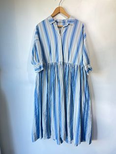 Casey Casey Blue Striped Dress. 100% cotton, marked size M but fits up to an XL. Lightweight fabric + pockets make this an easy breezy everyday dress. Approximate measurements:Arm to arm: 22"Length: 43" Dept Free, Everyday Dress, Blue Striped Dress, Easy Breezy, Everyday Dresses, Dress 100, Striped Dress, Boho Outfits, Lightweight Fabric