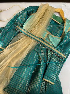 Rama green brocade kathak Anarkali costume with full 6 meters flair  - Bollywood costumes - fully custom made - indian attire - anarkali suit - kathak outfit - The outfit include : 7 meter flared Anarkali kurta, pants, dupatta , belt and jacket  We also deal in dance jewellery  Contact us on whatsapp +91 7737288355 Find us on Instagram : rhythmdancewears We customise any kind of Indian attire as per your choice and measurement. Just leave a message and we will contact you. Select fabric from our Green Chandbali Choli For Diwali, Pista Green Bollywood Sharara With Self Design, Anarkali Green Choli For Navratri, Gold Bollywood Choli With Dabka, Green Anarkali Set With Unstitched Blouse For Festive Occasions, Festive Green Anarkali Set With Unstitched Blouse, Transitional Green Anarkali Set In Art Silk, Bollywood Green Fitted Sharara, Green Bollywood Style Fitted Sharara