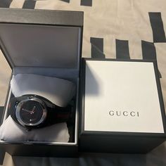 Brand New Gucci Watch Designer Black Watch With Analog Display, Designer Black Analog Watches, Modern Gucci Analog Watch, Gucci Black Luxury Watch, Gucci Analog Watch For Business, Designer Black Watch As Gift, Designer Black Watches Ideal For Gifts, Designer Black Watches For Gifts, Designer Black Watches For Gift